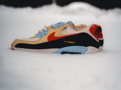 Stylish athletic shoes on a neutral background